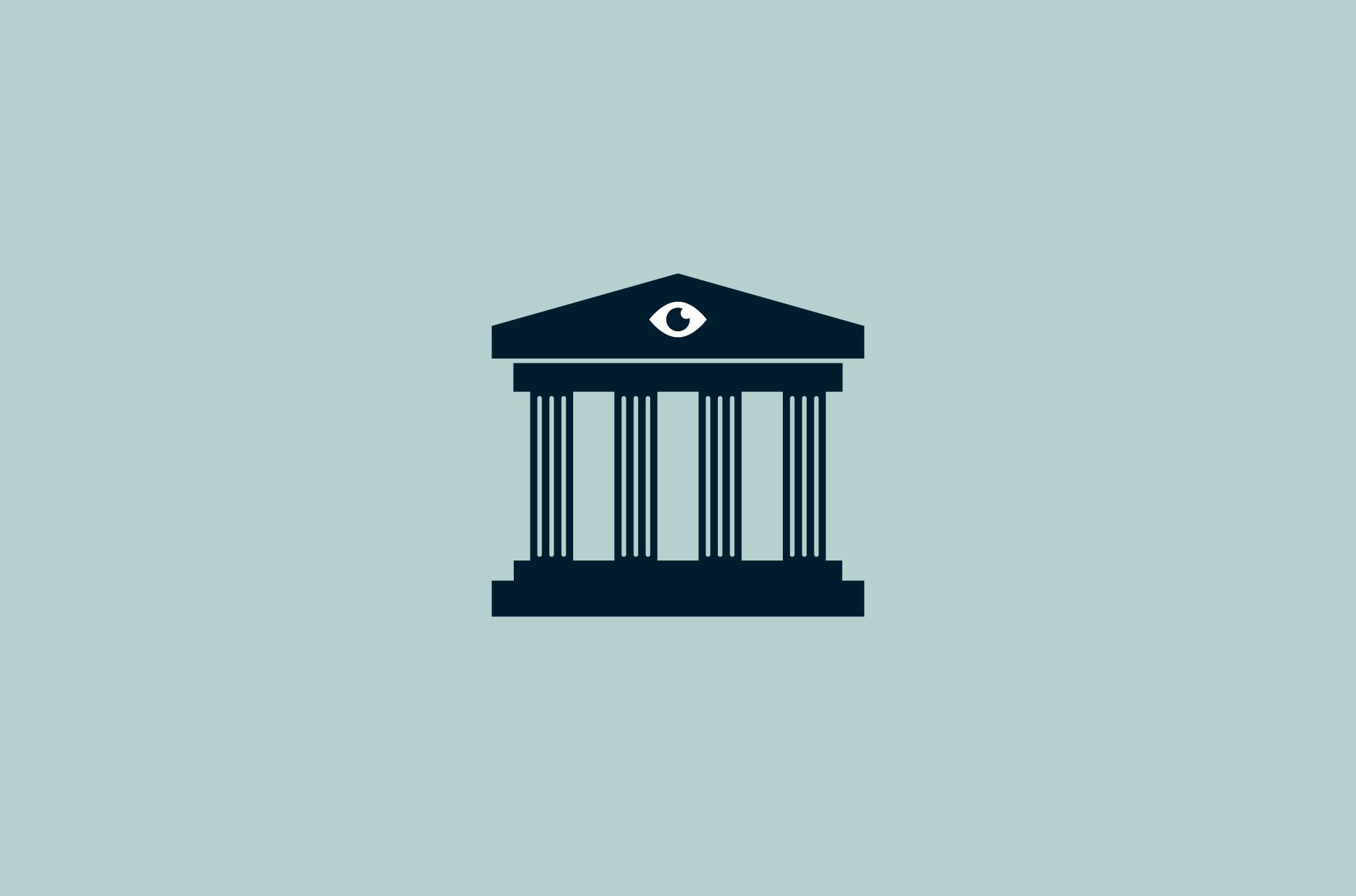 Building facade with columns and an eye.