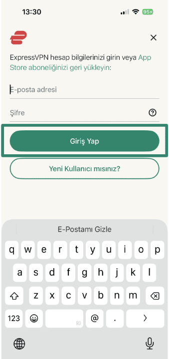 Logging into ExpressVPN using email address and password.