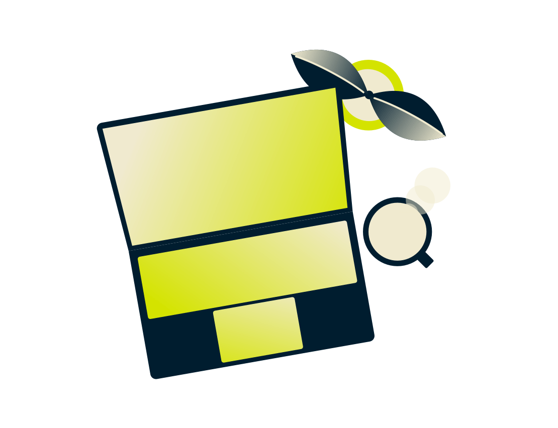 Bärbar dator med en växt och dryck.