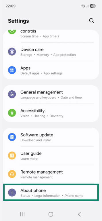 The "Settings" app on an Android phone. The "About phone" option is highlighted.